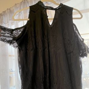 Lace top with open shoulders.